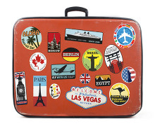 Suitcase with country travel stickers
